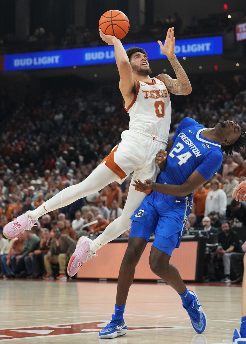 Texas forward Timmy Allen shoots over Creighton forward Arthur Kaluma during Thursday night's win at Moody Center. No. 2 Texas is 6-0 heading into its next game against No. 16 Illinois in the Jimmy V Classic next Tuesday.