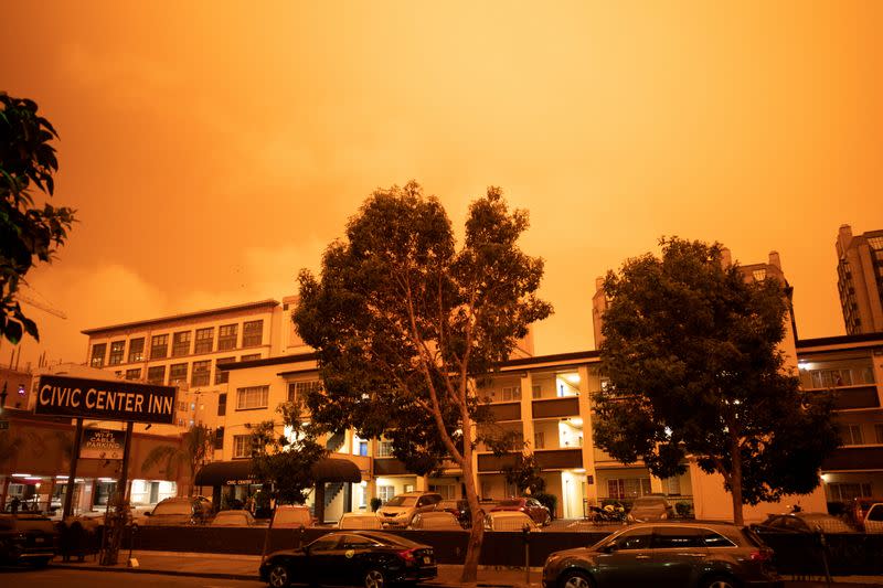 Orange smoke blankets San Francisco, California