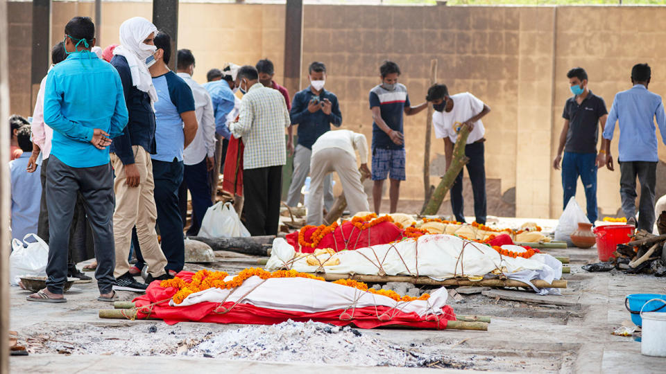 Several funeral pyres of people who died of Covid-19, pictured here during a mass cremation in New Delhi, India.