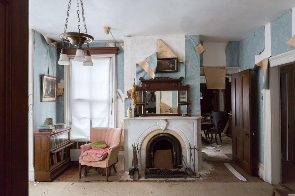 abandoned home long island living room fireplace