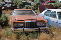 <p>Despite having not been on the road since 2001, this 1977 Mercury Cougar Brougham sedan still looks incredible. From this angle it appears to be 100% complete, and gives the impression that a little bit of elbow grease is all that’s keeping it from winning trophies at a classic car show.</p><p>However, it probably has some serious mechanical defects, and the fact that the hood is cracked open, means it may well have parted company with its V8.</p>