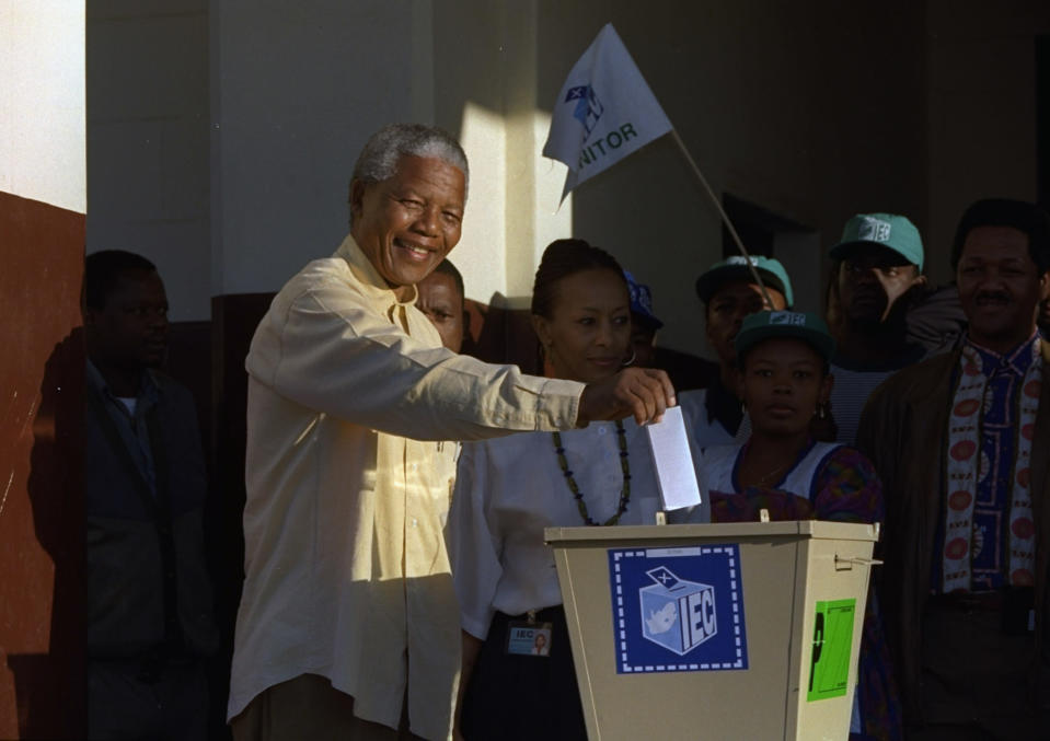 ANC leader Nelson Mandela casts his vote at Ohlange High School hall in Inanda, 10 miles (15 kilometers) north of Durban, Wednesday, April 27, 1994 for South Africa's first all-race elections. (AP Photo/John Parkin)