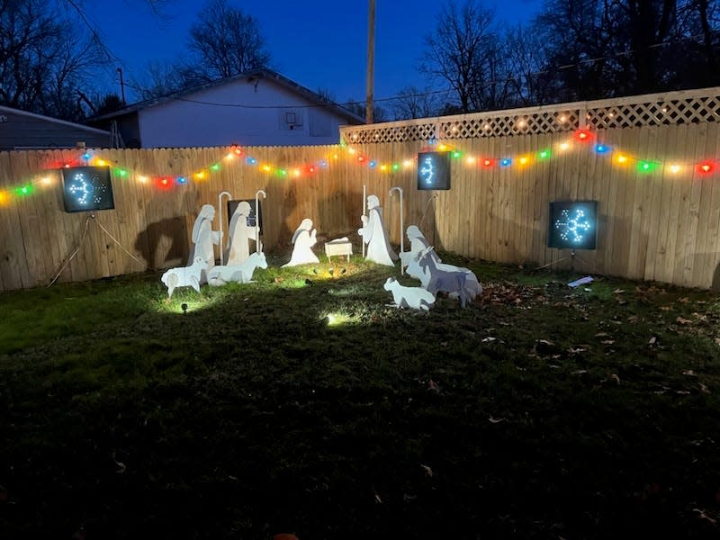 Don and Rhonda Long's front lawn, located at 2554 N. Grant Ave., features a large nativity scene, colored lights and digital snowflakes.
