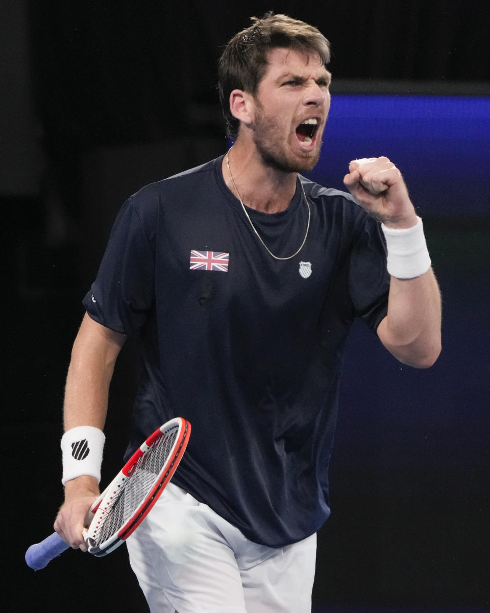 Britain's Cameron Norrie celebrates after defeating United States' Taylor Fritz at the United Cup tennis event in Sydney, Australia, Wednesday, Jan. 4, 2023. (AP Photo/Mark Baker)