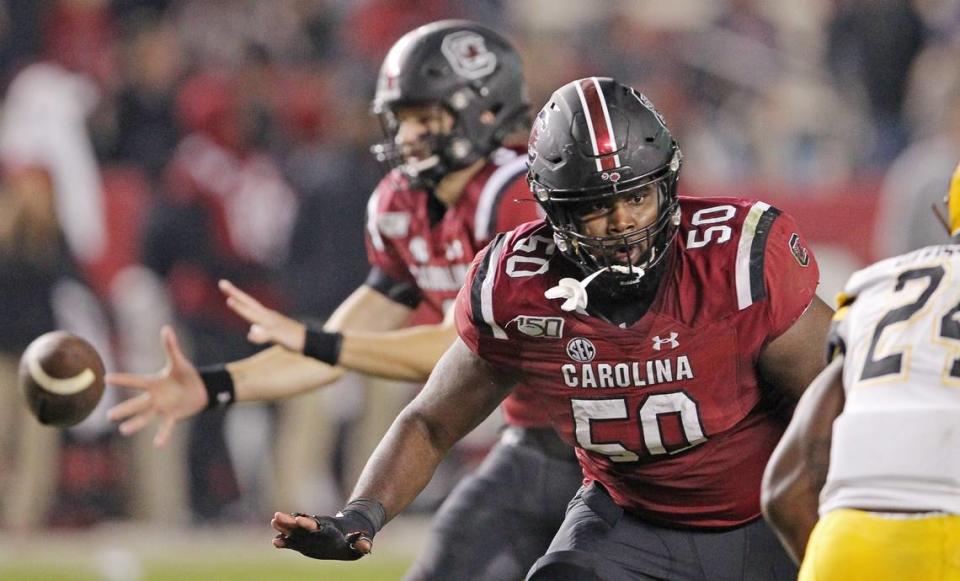 Former South Carolina offensive lineman Sadarius Hutcherson blocks as quarterback Ryan Hilinski takes a snap against Appalachian State in Columbia, S.C. on Saturday, Nov. 9, 2019.