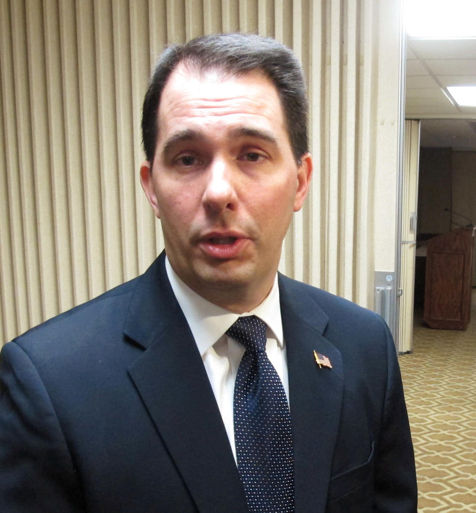 Wisconsin Gov. Scott Walker talks about the release of thousands of emails and other documents collected during a criminal investigation of a former aide on Wednesday, Feb. 19, 2014, in Madison, Wis. Walker said he expects his political enemies to use the emails against him, but he doesn't expect there to be any surprises. (AP Photo/Scott Bauer)