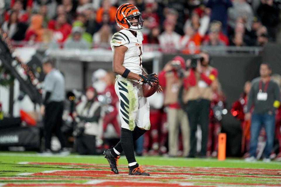 Cincinnati Bengals wide receiver Ja'Marr Chase (1) celebrates a touchdown catch in the fourth quarter during a Week 15 NFL game against the Tampa Bay Buccaneers, Sunday, Dec. 18, 2022, at Raymond James Stadium in Tampa, Fla. The Cincinnati Bengals won, 34-23. The Cincinnati Bengals improved to 10-4 on the season. 