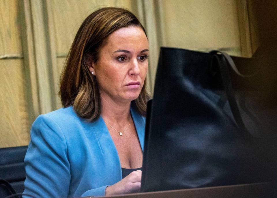 Defense attorney Michelle Borchew prepares for a hearing in court at the Richard E Gerstein Justice Building.