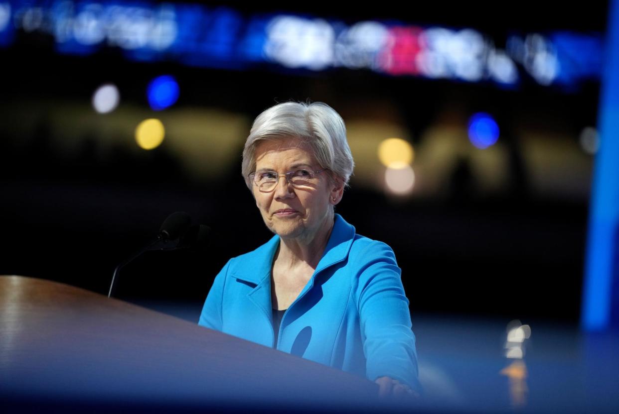 <span>Elizabeth Warren speaks on stage on the final day of the Democratic national convention in Chicago, Illinois, on Thursday.</span><span>Photograph: Andrew Harnik/Getty Images</span>