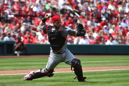 Jul 15, 2018; St. Louis, MO, USA; Cincinnati Reds catcher Tucker Barnhart (16) throws out St. Louis Cardinals second baseman Kolten Wong (not pictured) during the fifth inning at Busch Stadium. Mandatory Credit: Jeff Curry-USA TODAY Sports