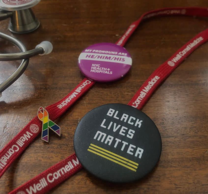 A close-up of the author's rainbow, Black Lives Matter and pronoun pins. (Photo: Courtesy of Lala Tanmoy Das)