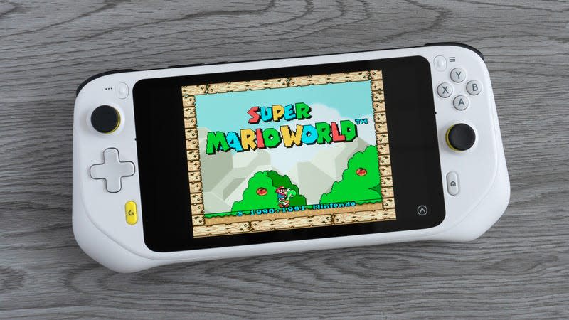 Super Mario World being played on the Logitech G Cloud through emulation against a gray wooden background.