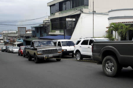 A truck that ran out of gas is towed with a rope in a queue for gas near a gas station of the Venezuelan state-owned oil company PDVSA in San Cristobal, Venezuela November 10, 2018. REUTERS/Carlos Eduardo Ramirez