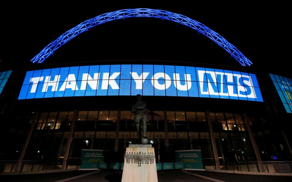 How to thank the NHS with tonight's Clap for Carers - REUTERS 