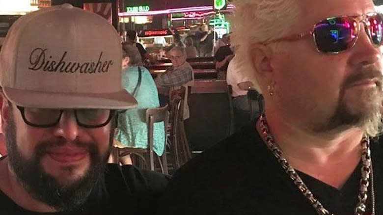 Guy Fieri and Carl Ruiz at a bar together