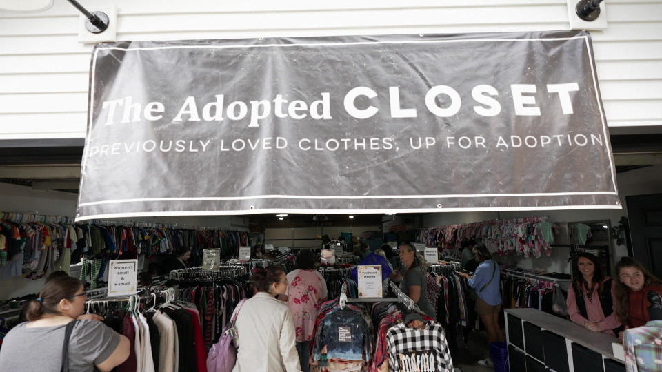 Adoptive mom Brittany Berrie turned her garage into the Adopted Closet thrift store. / Credit: CBS News