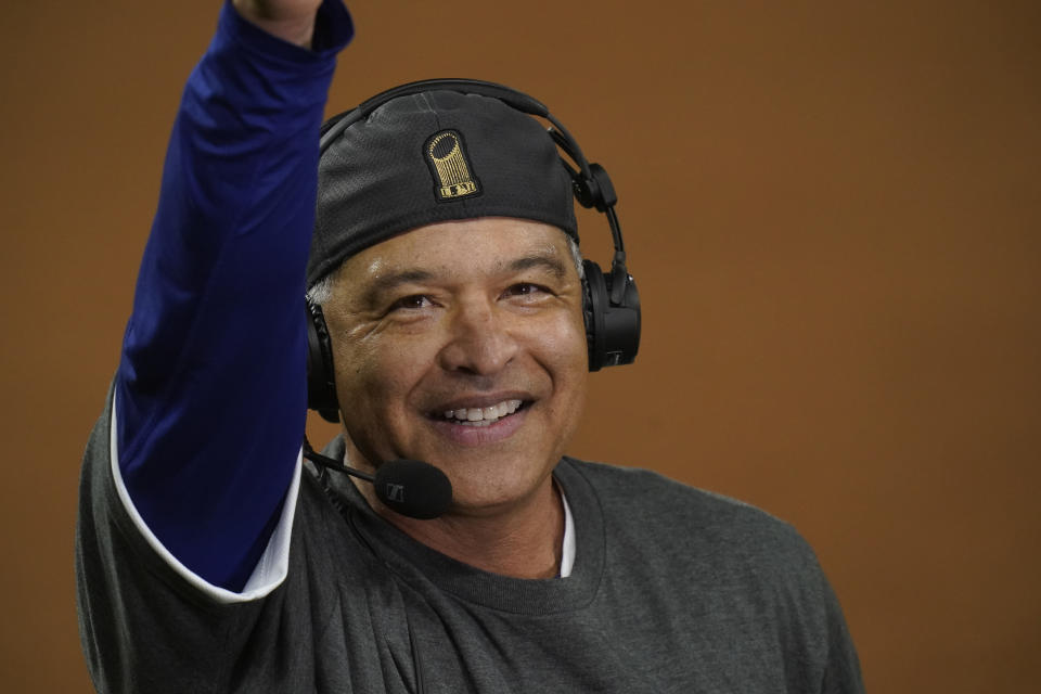 Los Angeles Dodgers manager Dave Roberts celebrates after defeating the Tampa Bay Rays 3-1 to win the baseball World Series in Game 6 Tuesday, Oct. 27, 2020, in Arlington, Texas. (AP Photo/Eric Gay)