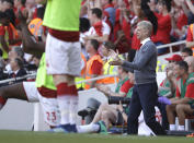 <p>Arsenal’s French manager Arsene Wenger celebrates his side’s third goal during the English Premier League soccer match between Arsenal and Burnley at the Emirates Stadium in London, Sunday, May 6, 2018. The match is Arsenal manager Arsene Wenger’s last home game in charge after announcing in April he will stand down as Arsenal coach at the end of the season after nearly 22 years at the helm. (AP Photo/Matt Dunham) </p>