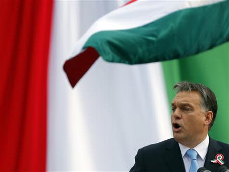 Hungarian Prime Minister Viktor Orban delivers a speech during the 166th anniversary of the anti-Habsburg revolution in Budapest March15, 2014. REUTERS/Laszlo Balogh