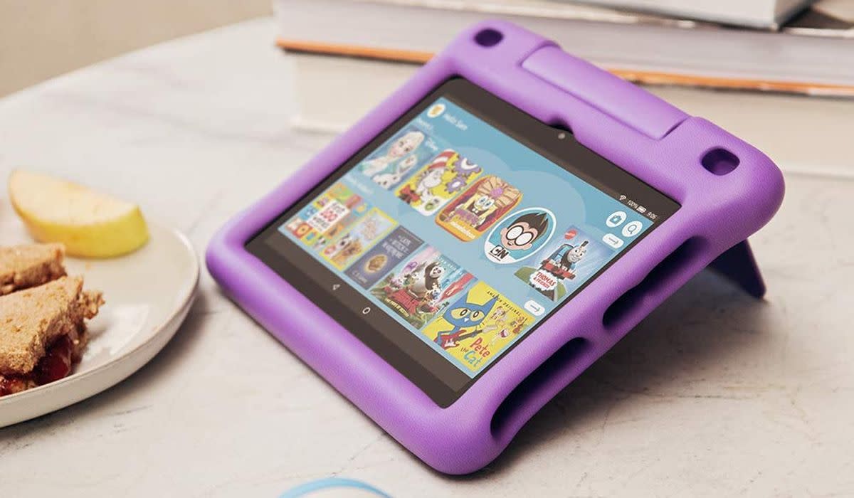 An Amazon Fire HD tablet in a protective purple case. 