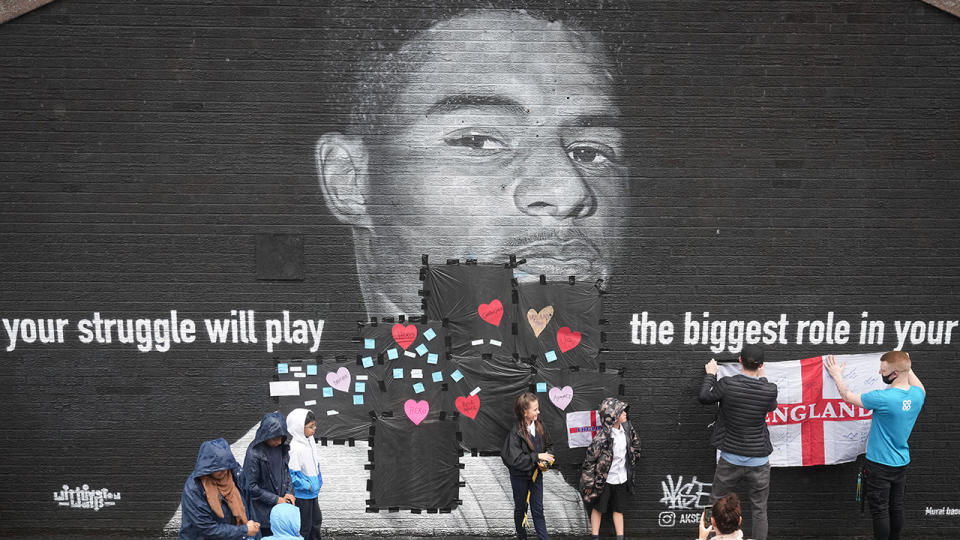 After a mural of Marcus Rashford was defaced following England's Euro 2020 some have chosen to try to repair the damage in the days after. (Photo by Christopher Furlong/Getty Images)