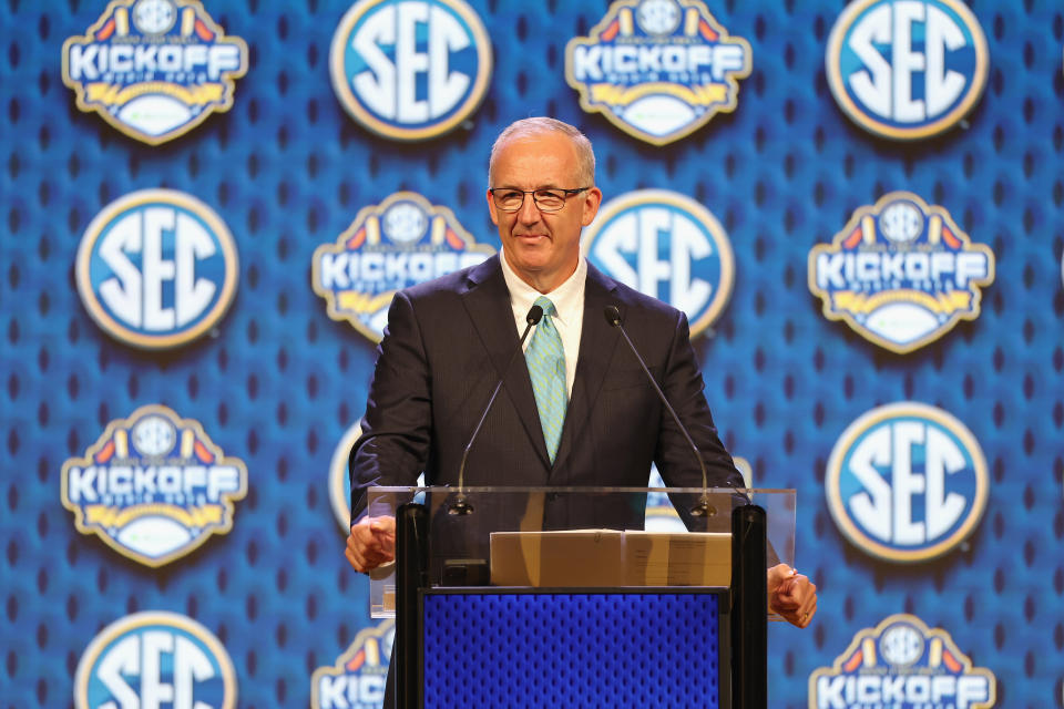 SEC commissioner Greg Sankey speaks during SEC media days on July 15. (Tim Warner/Getty Images)