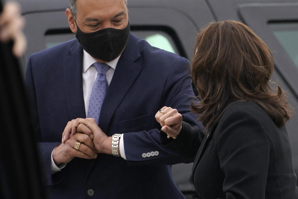 Vice President Kamala Harris exchanges and elbow bump greeting with Sen. Alex Padilla, D-Calif., on arrival in Oakland, Calif., Monday, April 5, 2021. (AP Photo/Jacquelyn Martin)