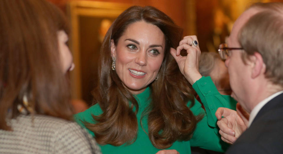 The Duchess of Cambridge wore Emilia Wickstead to attend a reception hosted by Queen Elizabeth II ahead of the NATO alliance summit. [Photo: Getty]