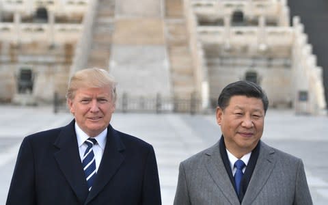 US President Donald Trump and Chinese President Xi Jinping are having a trade spat - Credit: Jim Watson/AFP