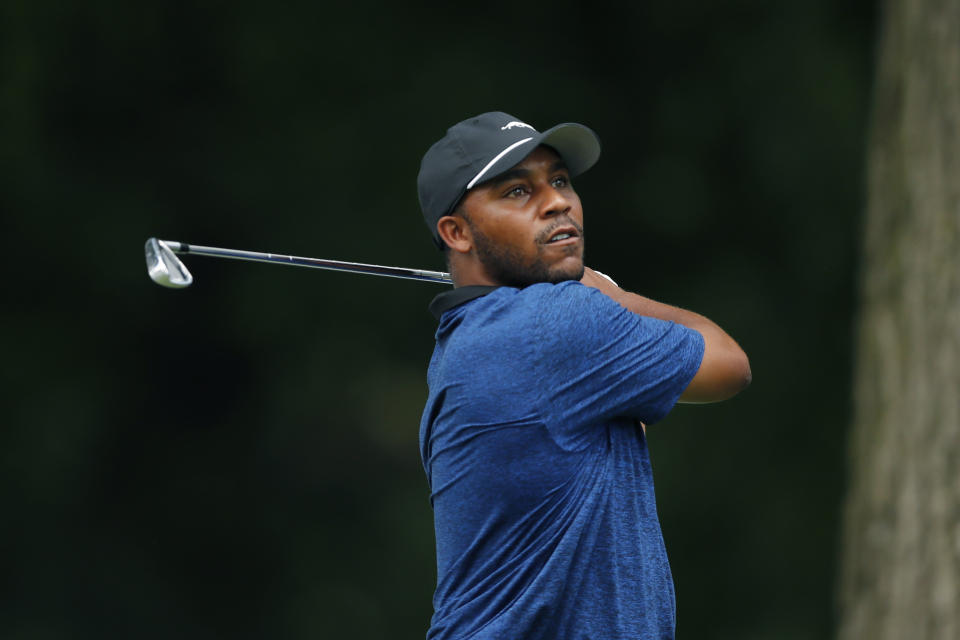 Harold Varner III drives during a nine-hole exhibition ahead of the Rocket Mortgage Classic golf tournament, Wednesday, July 1, 2020, at the Detroit Golf Club in Detroit. (AP Photo/Carlos Osorio)