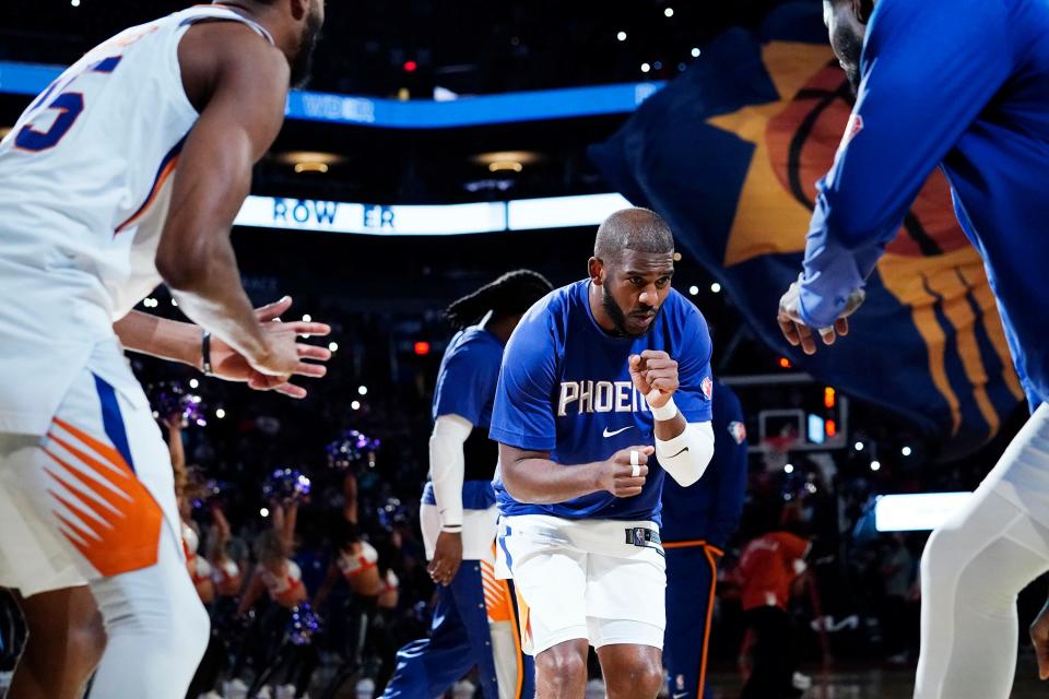 Oct 27, 2021; Phoenix, Arizona, USA; Phoenix Suns guard Chris Paul (3) during team introductions against the Sacramento Kings at Footprint Center.