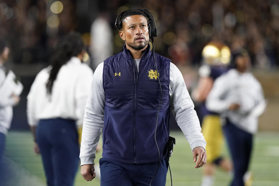 Notre Dame head coach Marcus Freeman looks at the scoreboard during the first half against Stanford in South Bend, Ind., Saturday, Oct. 15, 2022. (AP Photo/Nam Y. Huh)