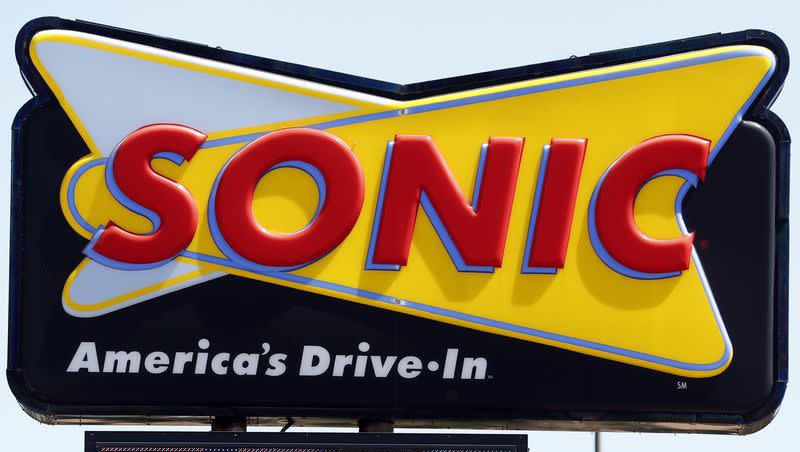 A Sonic drive-in beckons customers in Jackson, Miss., Thursday, June 13, 2019. Sonic is offering free cheeseburgers for Teacher Appreciation Week starting May 9.