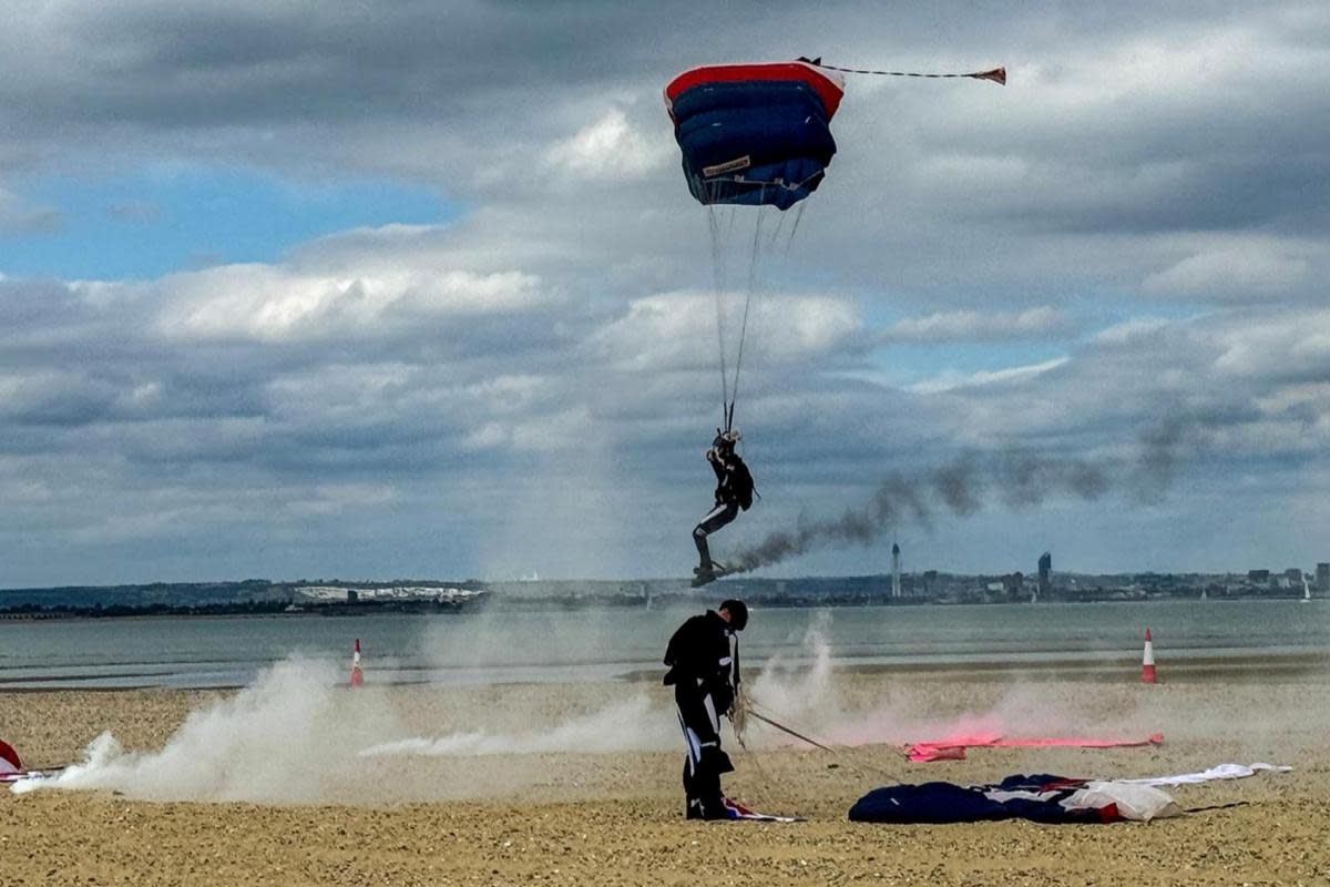 Royal Navy parachute team land on beach. <i>(Image: Pamela Parker)</i>