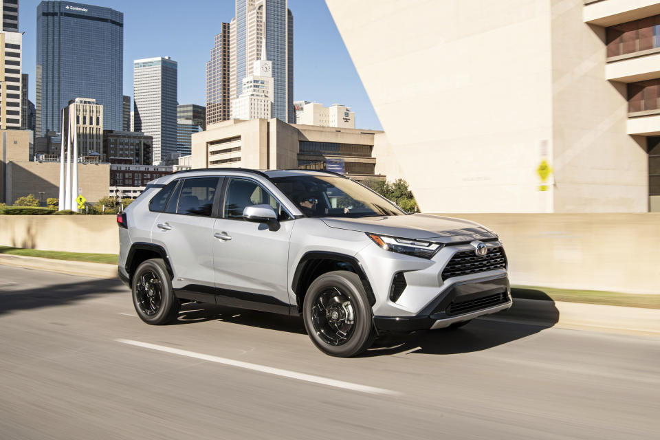 This photo provided by Toyota shows the 2022 Toyota RAV4 Hybrid, a compact SUV that gets about 40 mpg in mixed driving. (Courtesy of Toyota Motor Sales U.S.A. via AP)