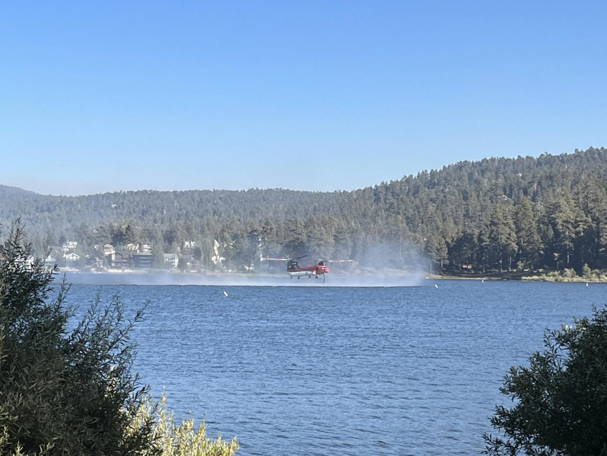 CAL FIRE aircraft picking up water to fight Line Fire