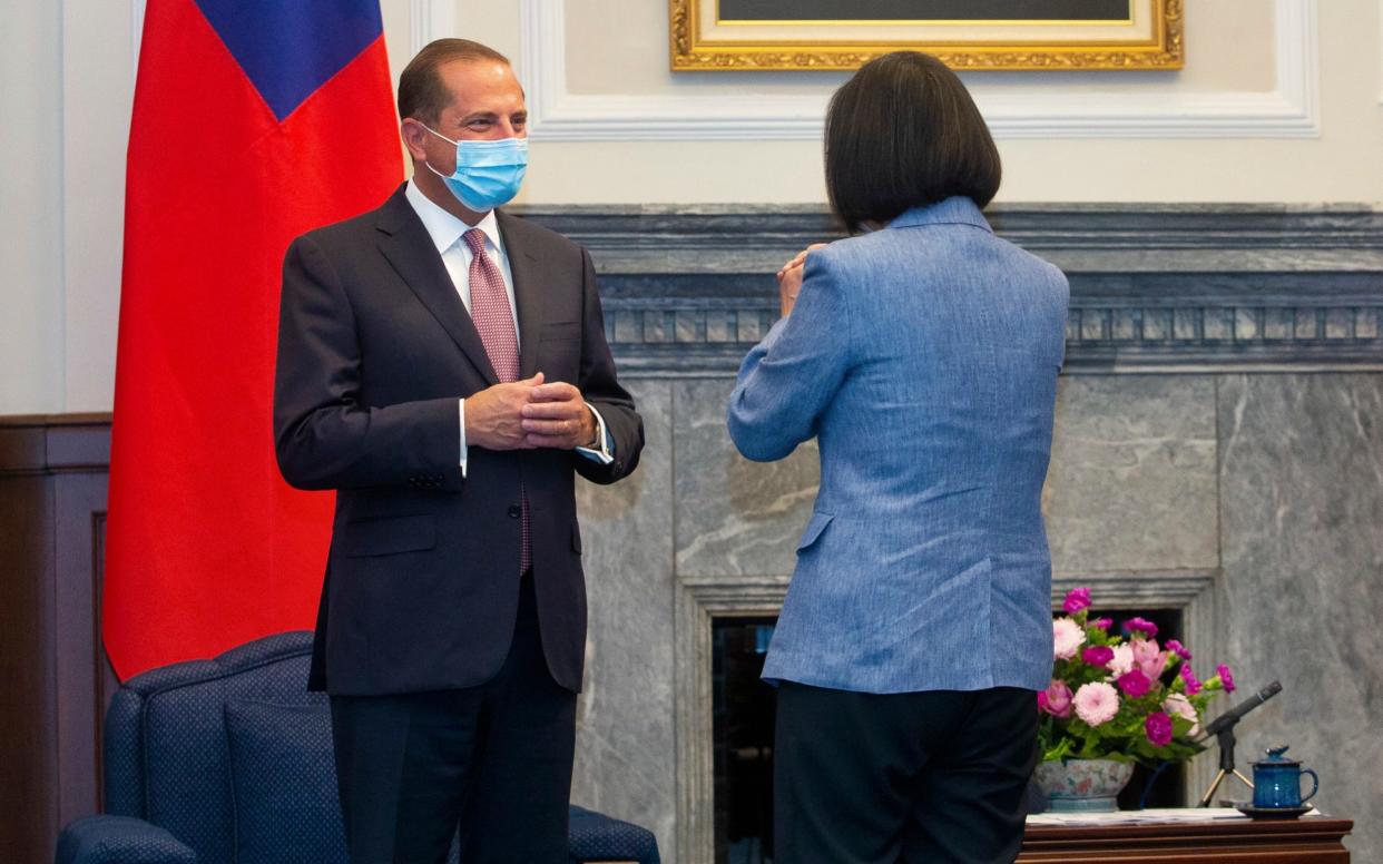 US Health and Human Services Secretary Alex Azar, left, is greeted by Taiwan's President Tsai Ing-wen, right, during a meeting in Taipei, Taiwan  - Pool Central News Agency