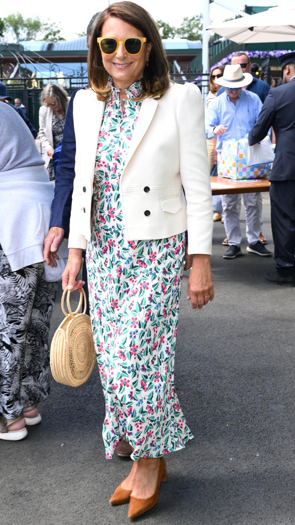 Carole Middleton, wearing a floral dress and cream blazer, attends day four of Wimbledon 2024