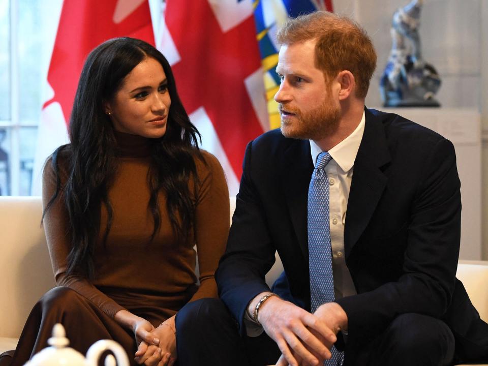 Prince Harry, Duke of Sussex and Meghan, Duchess of Sussex gesture during their visit to Canada House in thanks for the warm Canadian hospitality and support they received during their recent stay in Canada, in London on January 7, 2020