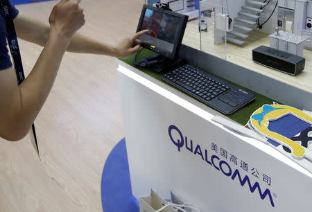 A man visits Qualcomm's booth at the Global Mobile Internet Conference (GMIC) 2017 in Beijing, China April 28, 2017. Picture taken April 28, 2017. REUTERS/Jason Lee