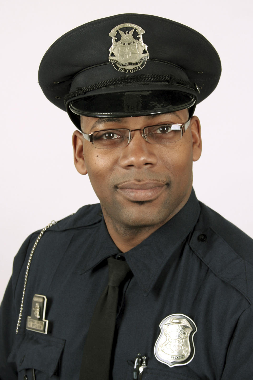 This undated photo provided by the Detroit Police Department shows Officer Rasheen McClain. A gunman who fatally shot Detroit officer McClain and wounded another was trying "to bait" them as they searched a home for him, police Chief James Craig said Thursday, Nov. 21, 2019. McClain was shot in the neck. His partner, officer Phillippe Batoum-Bisse, was shot in the leg. "He was a leader, very tactical, very much about doing a great job," Craig said about McClain. (Detroit Police Department via AP)