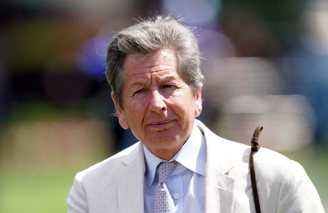 The Queen's racing manager John Warren attended the funeral service at Westminster Abbey