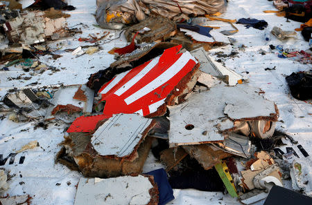 FILE PHOTO - Wreckage recovered from Lion Air flight JT610, that crashed into the sea, lies at Tanjung Priok port in Jakarta, Indonesia, October 29, 2018. REUTERS/Willy Kurniawan/File Photo