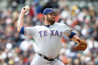 DETROIT, MI - APRIL 22: Colby Lewis #48 of the Texas Rangers pitches in the first inning during the game against the Detroit Tigers at Comerica Park on April 22, 2012 in Detroit, Michigan. (Photo by Leon Halip/Getty Images)