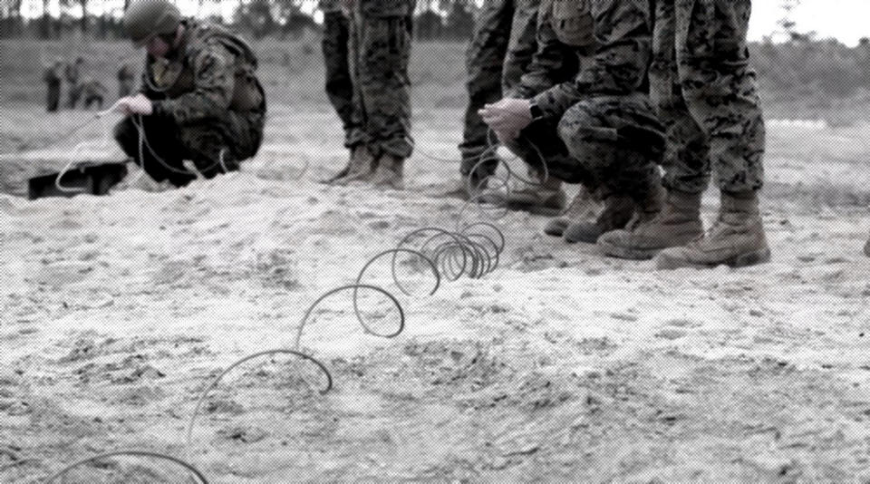 A photo illustration of Marines training with plastic explosives at Marine Corps Engineer School at Camp Lejeune in Jacksonville, North Carolina. (AP Illustration)