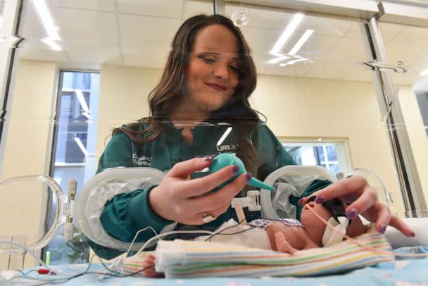 PHOTO: Jade England is following in her mother's footsteps as a NICU nurse. England just began her new job as a nurse at the UAB Women and Infants Center's Regional Neonatal Intensive Care Unit. (Frank Couch/UAB School of Nursing)