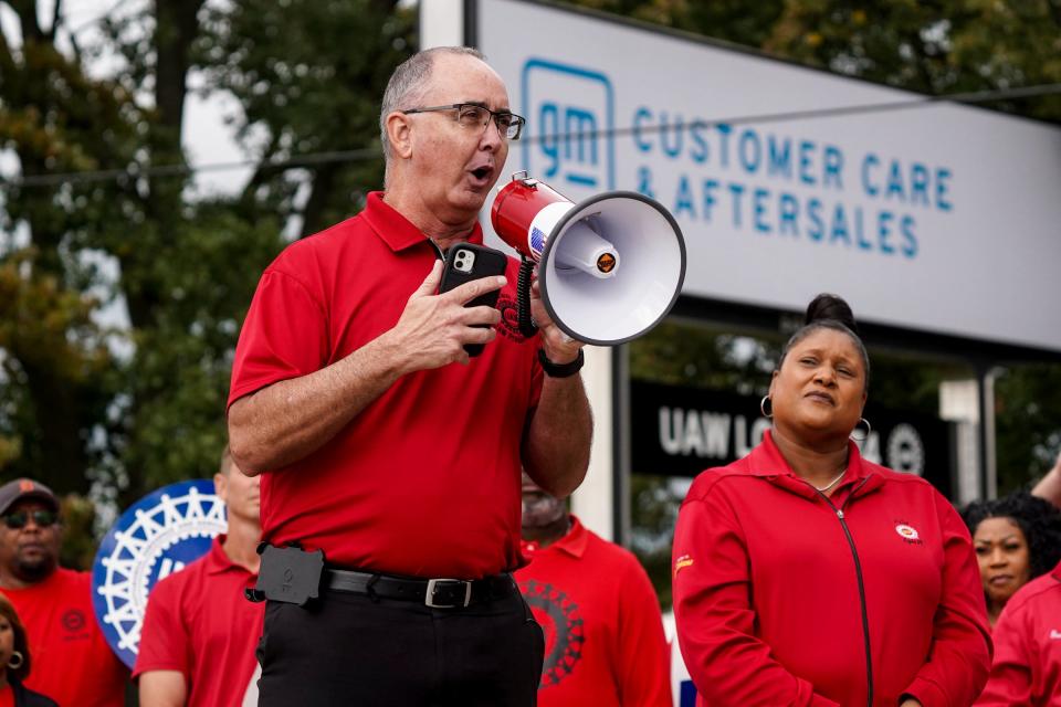 UAW President Shawn Fain speaks to workers picketing at General Motors Willow Run Redistribution in Van Buren Township on Tuesday, Sept. 26, 2023, during a stop to Michigan by President Joe Biden.