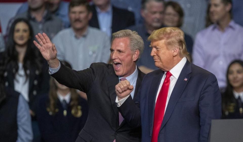 House Minority Leader Kevin McCarthy and U.S. President Donald Trump attend a legislation signing rally with local farmers on February 19, 2020 in Bakersfield, California. (Photo by David McNew/Getty Images)