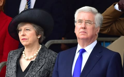 Theresa May alongside Sir Michael at the Military Drumhead Service in London in May  - Credit: Dominic Lipinski/PA Wire