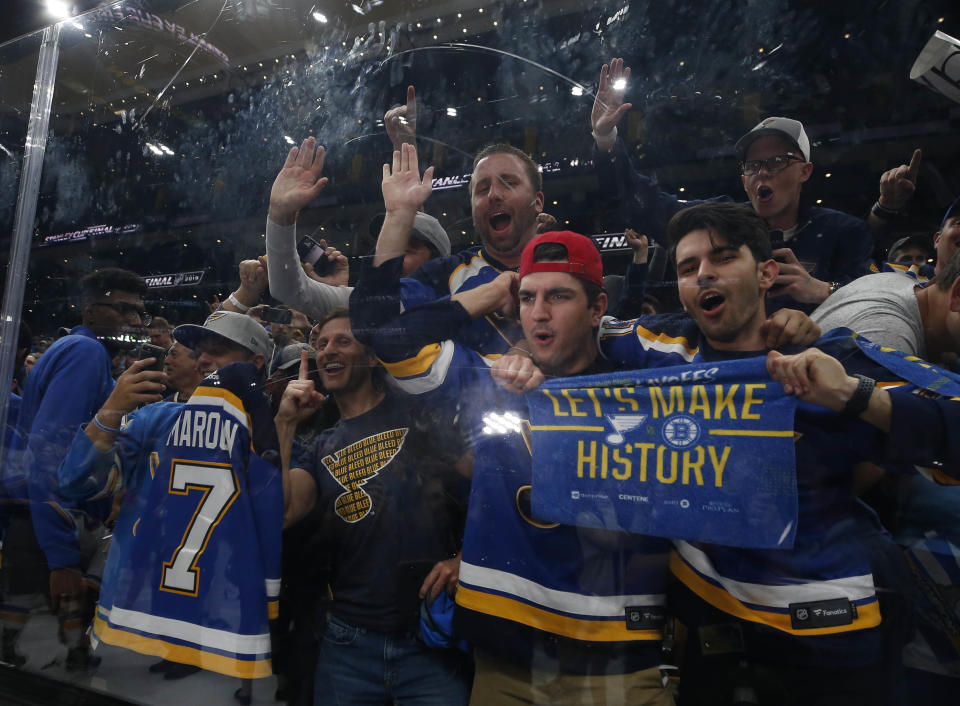 Jun 12, 2019; Boston, MA, USA; St. Louis Blues fans celebrate after their team defeated the Boston Bruins in game seven of the 2019 Stanley Cup Final at TD Garden. Mandatory Credit: Winslow Townson-USA TODAY Sports